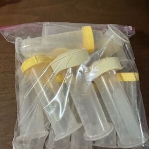 Medela Yellow and Clear Storage Bottles Set of 15 (Lot # 1)